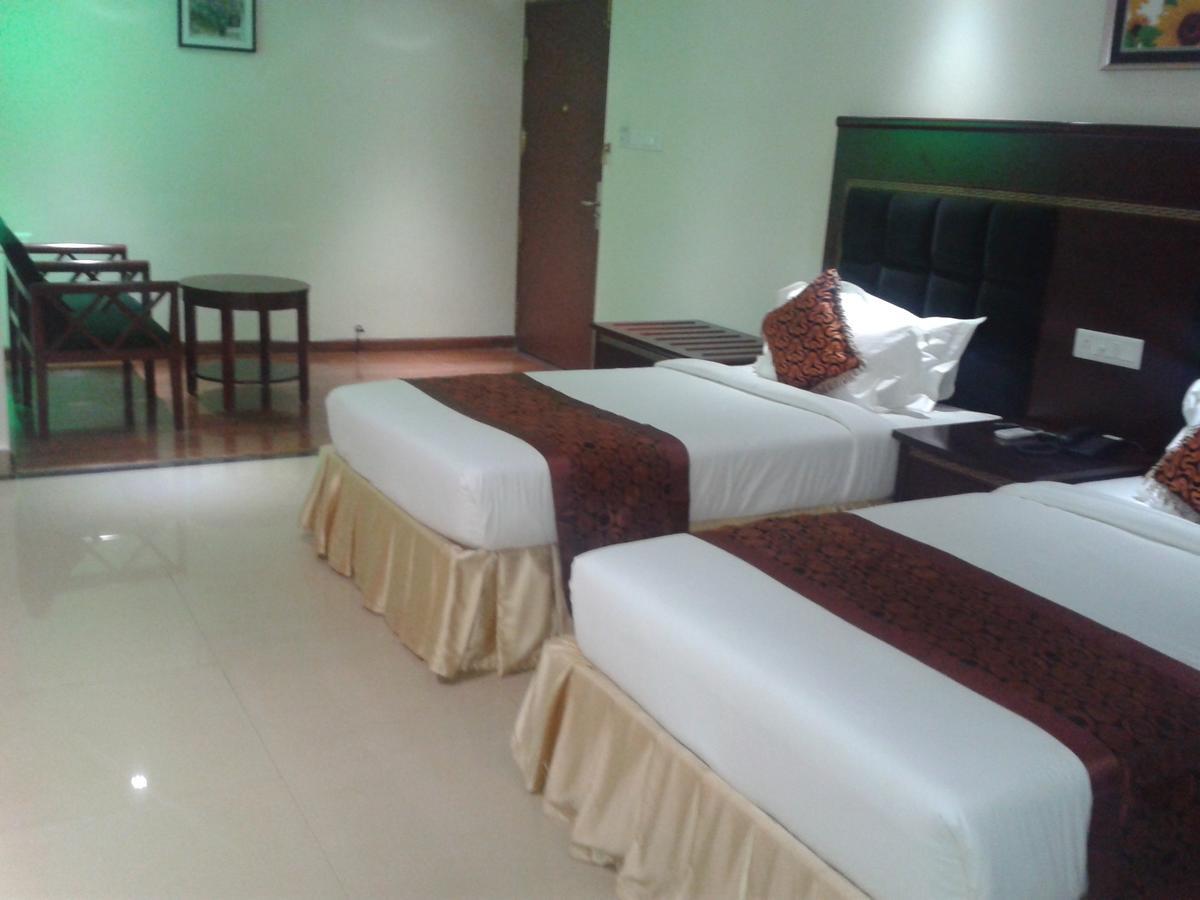 Hotel Hiton Perintalmanna Kamer foto